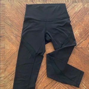 Lululemon black size 4 leggings with mesh stripe